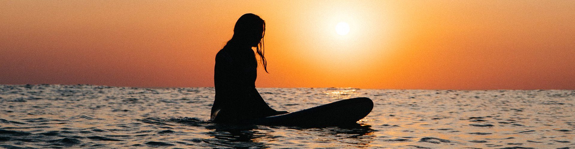 Planet Surf Camps junior surfer looking for the Wave