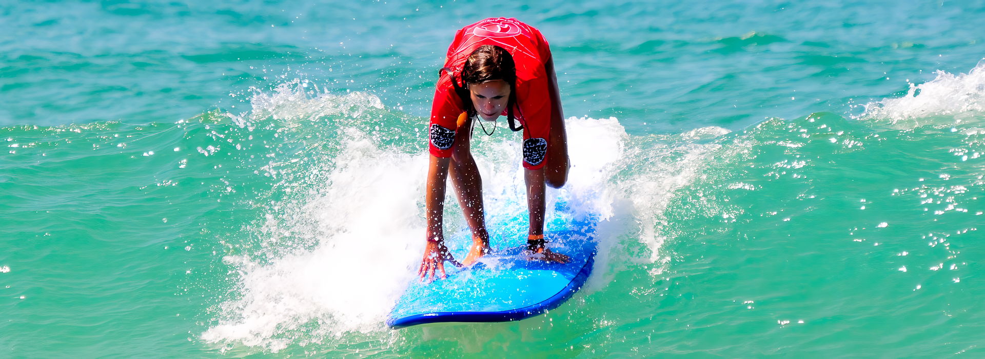 Learn surf on a sunny day with Planet Surf Camps France